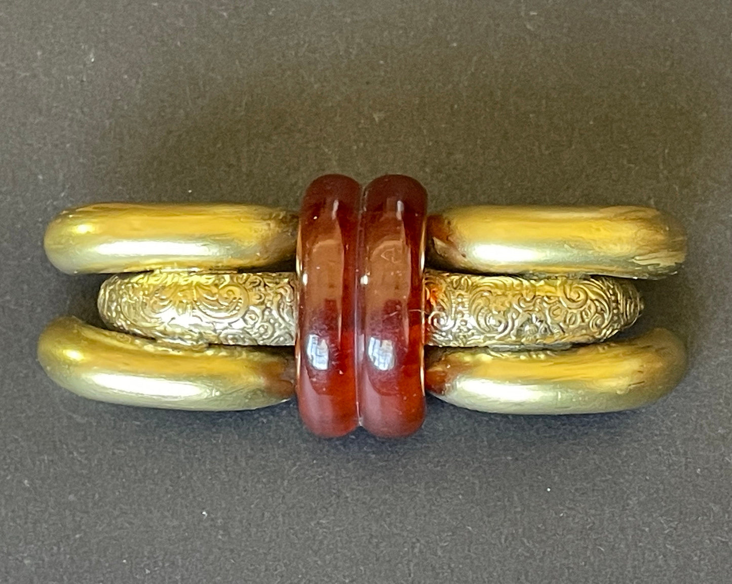 Large vintage rootbeer Bakelite (verified) and gold tone pinchbeck ? Art Deco machine age geometric brooch, classic 1930s design