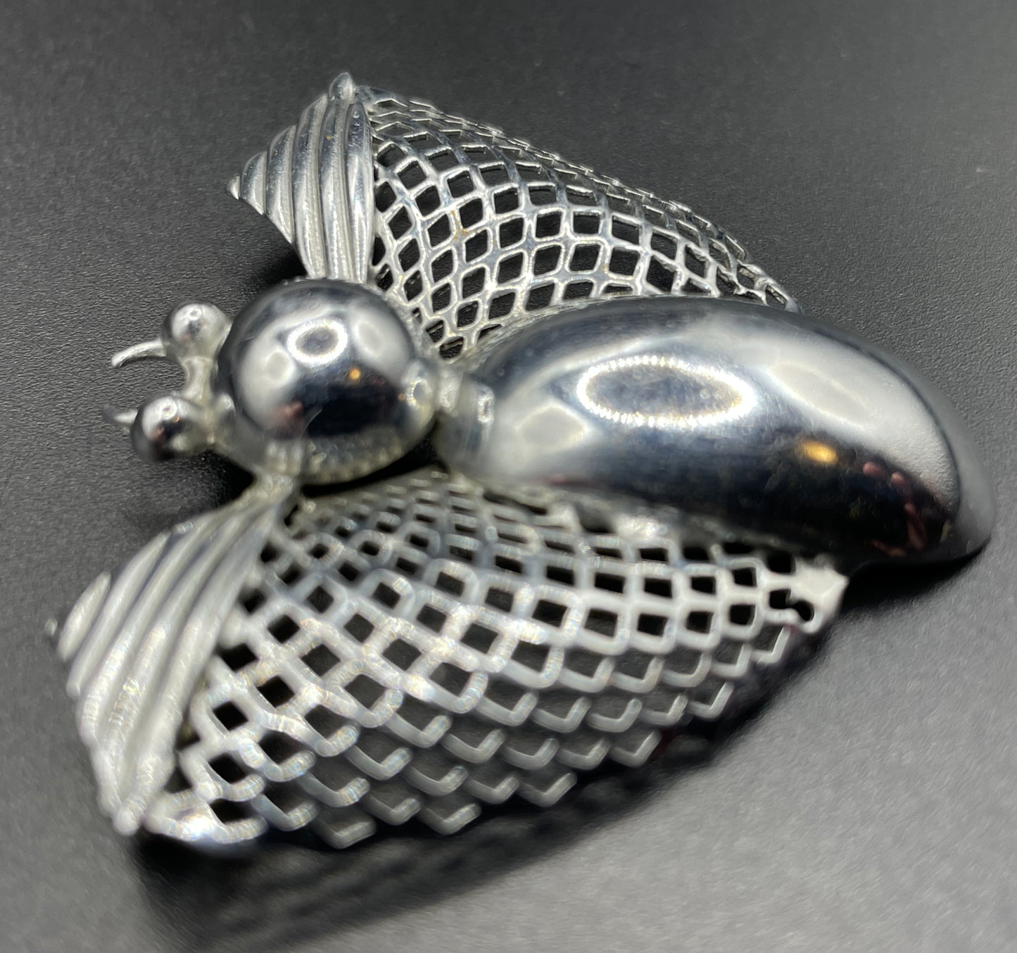 Vintage Art Deco machine age chrome stylised moth or butterfly bug brooch, 1930s