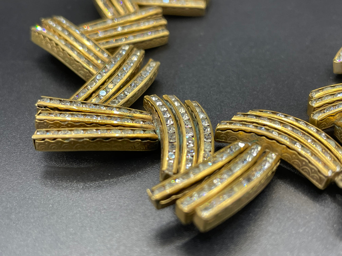 Vintage Schreiber and Hiller Art Deco channel set paste unusual spiky design cocktail bracelet, clear rhinestones and gold tone, boxed