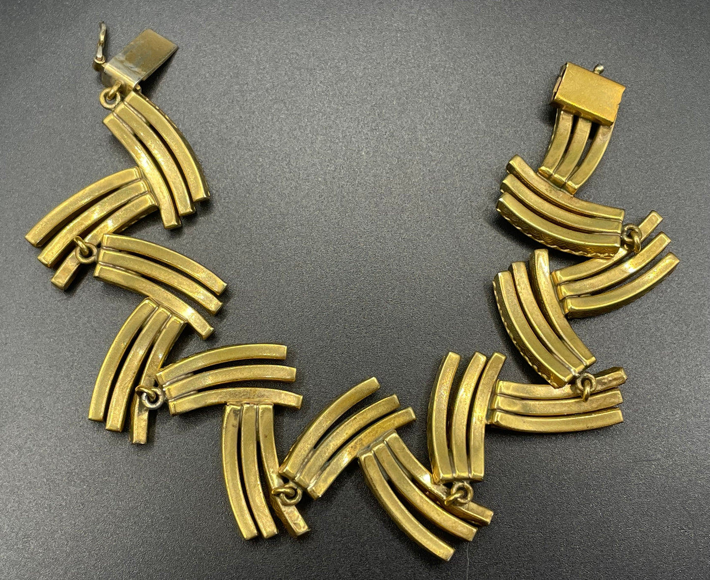 Vintage Schreiber and Hiller Art Deco channel set paste unusual spiky design cocktail bracelet, clear rhinestones and gold tone, boxed