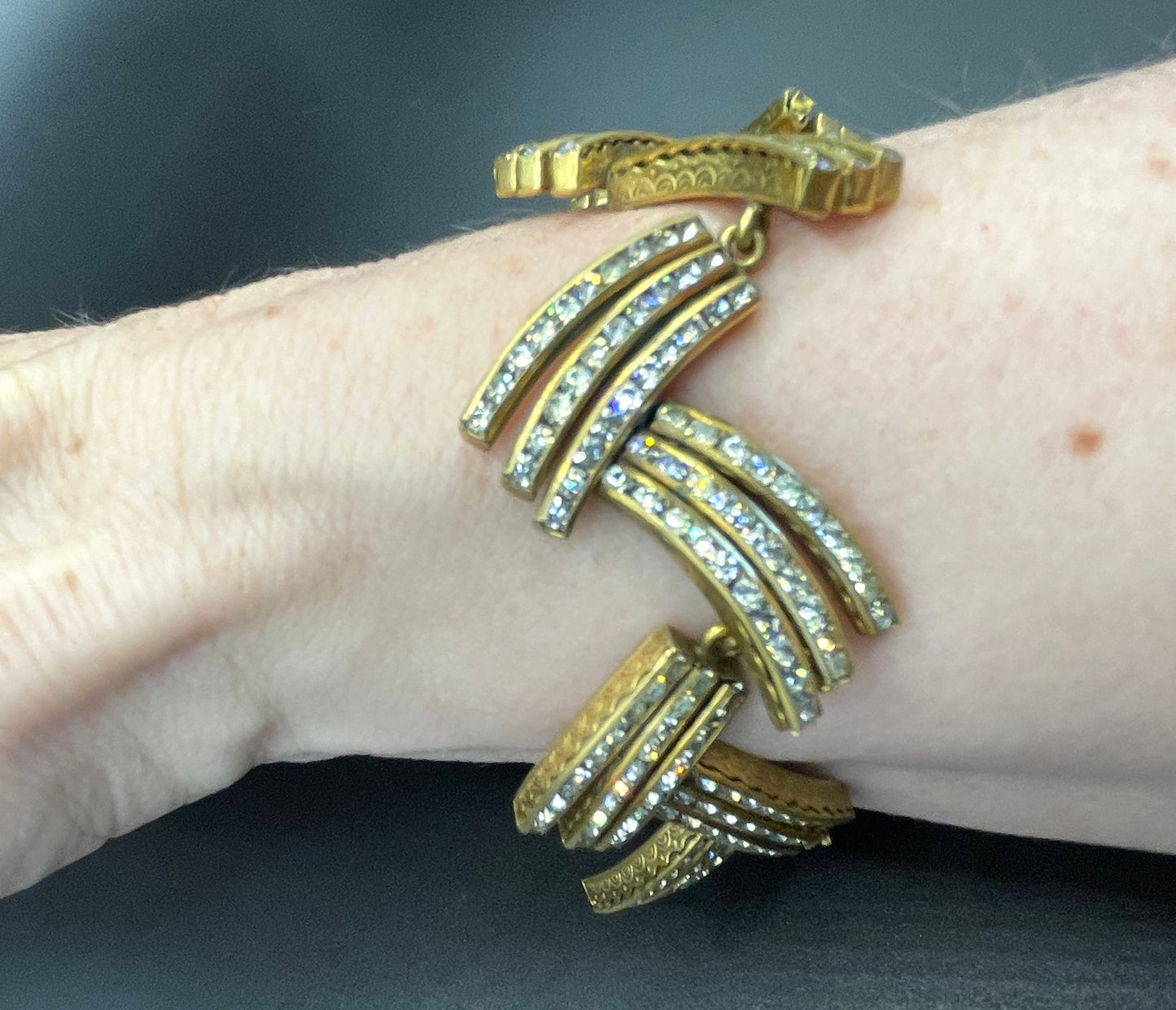 Vintage Schreiber and Hiller Art Deco channel set paste unusual spiky design cocktail bracelet, clear rhinestones and gold tone, boxed