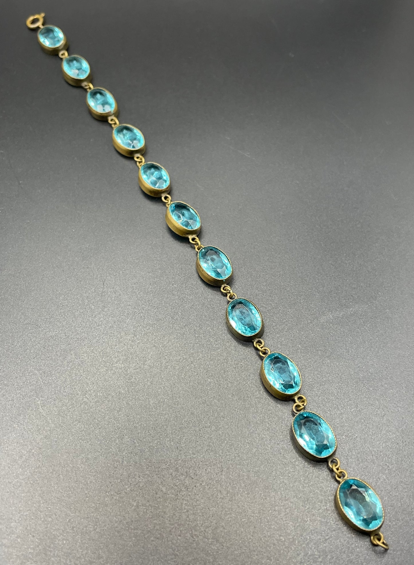 Vintage sapphire blue paste riviere collet set bracelet, bezel set, open backed large, oval glass stones, generous length