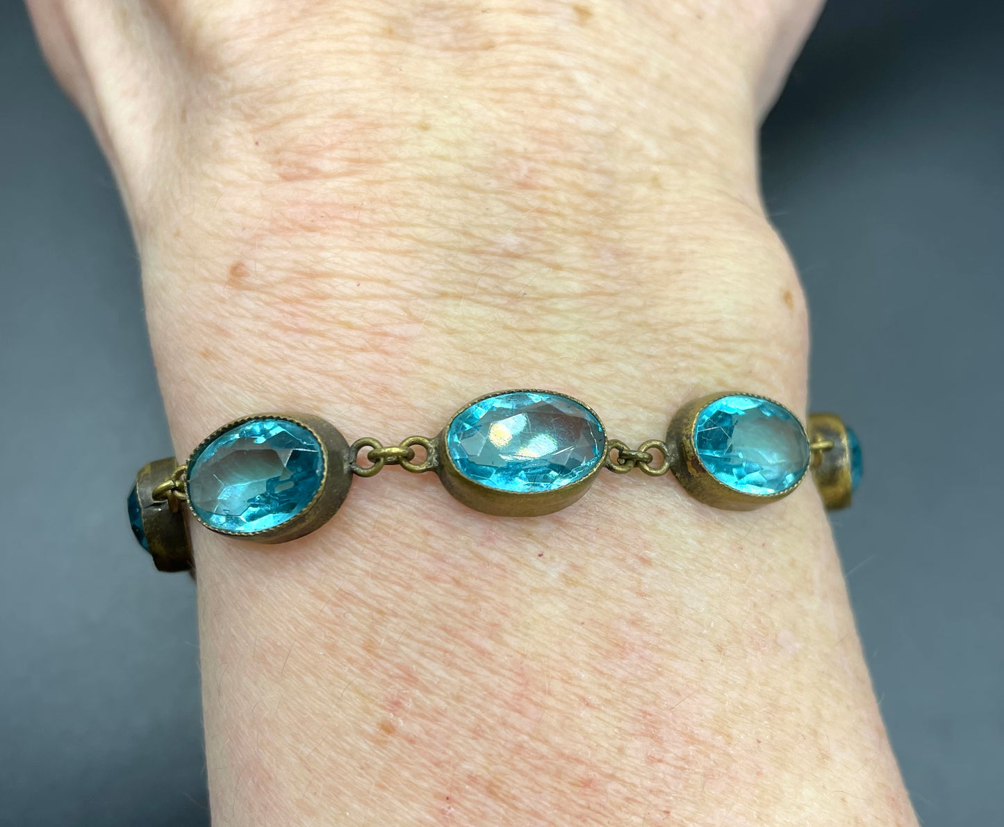Vintage sapphire blue paste riviere collet set bracelet, bezel set, open backed large, oval glass stones, generous length