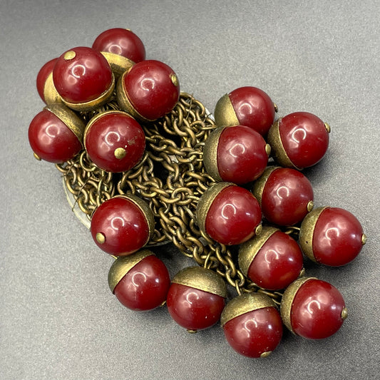 Large vintage Art Deco cherry red Bakelite (verified) berry and gold tone dress clip / pendant, Miriam Haskell style