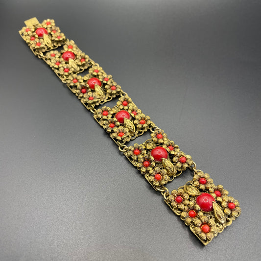 Vintage Art Deco Czech gold tone filigree and red coral glass cabochon panel bracelet, Neiger Brothers?