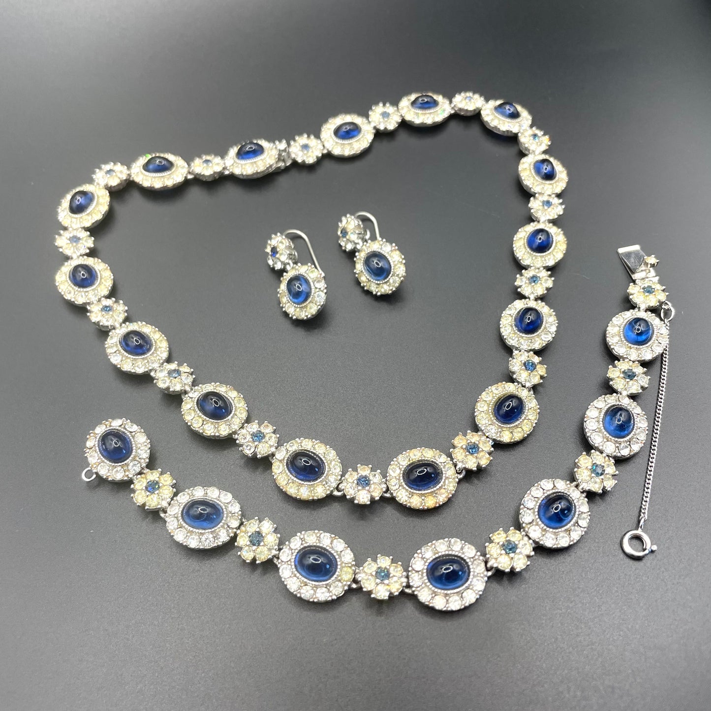 Vintage signed Ciner sapphire blue cabochon and clear rhinestone choker necklace, bracelet and dangle earrings for pierced ears