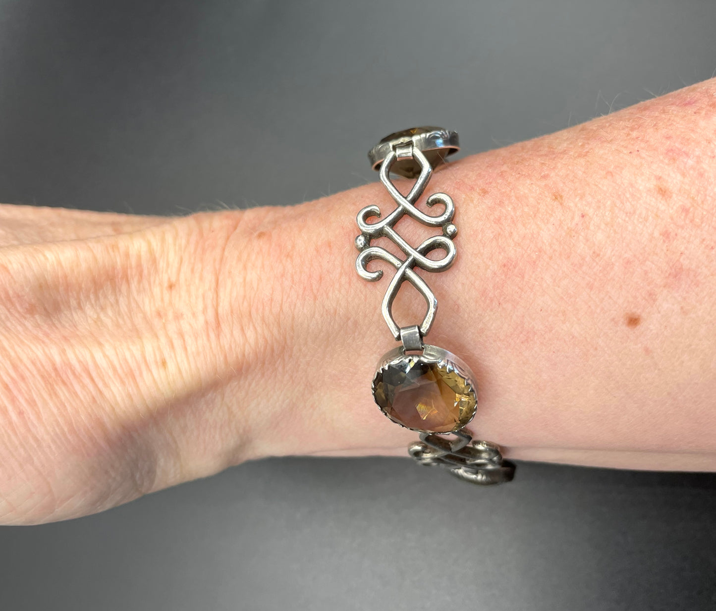 Antique Victorian large Cairngorm gemstone bracelet with sterling silver claw settings and ornate curlicue sterling silver panels