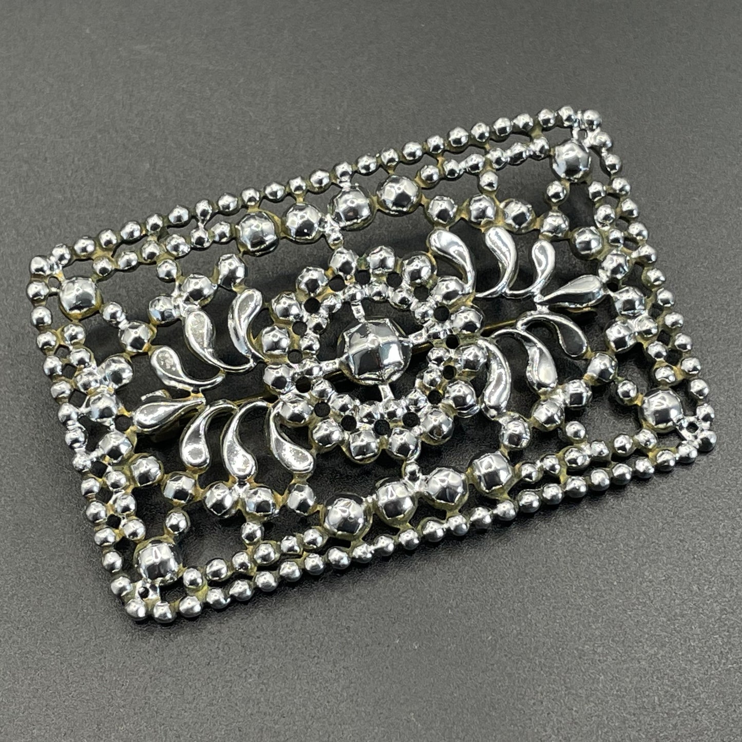 Antique Georgian faceted cut steel effect on brass brooch, rectangular shaped, beautifully ornate sparkly piece