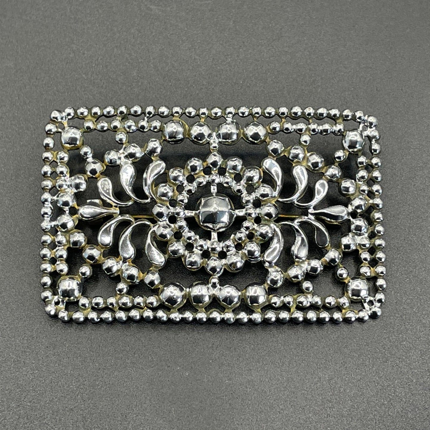 Antique Georgian faceted cut steel effect on brass brooch, rectangular shaped, beautifully ornate sparkly piece