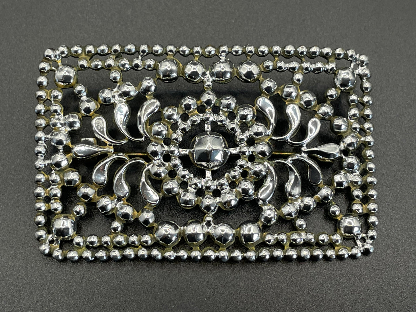 Antique Georgian faceted cut steel effect on brass brooch, rectangular shaped, beautifully ornate sparkly piece