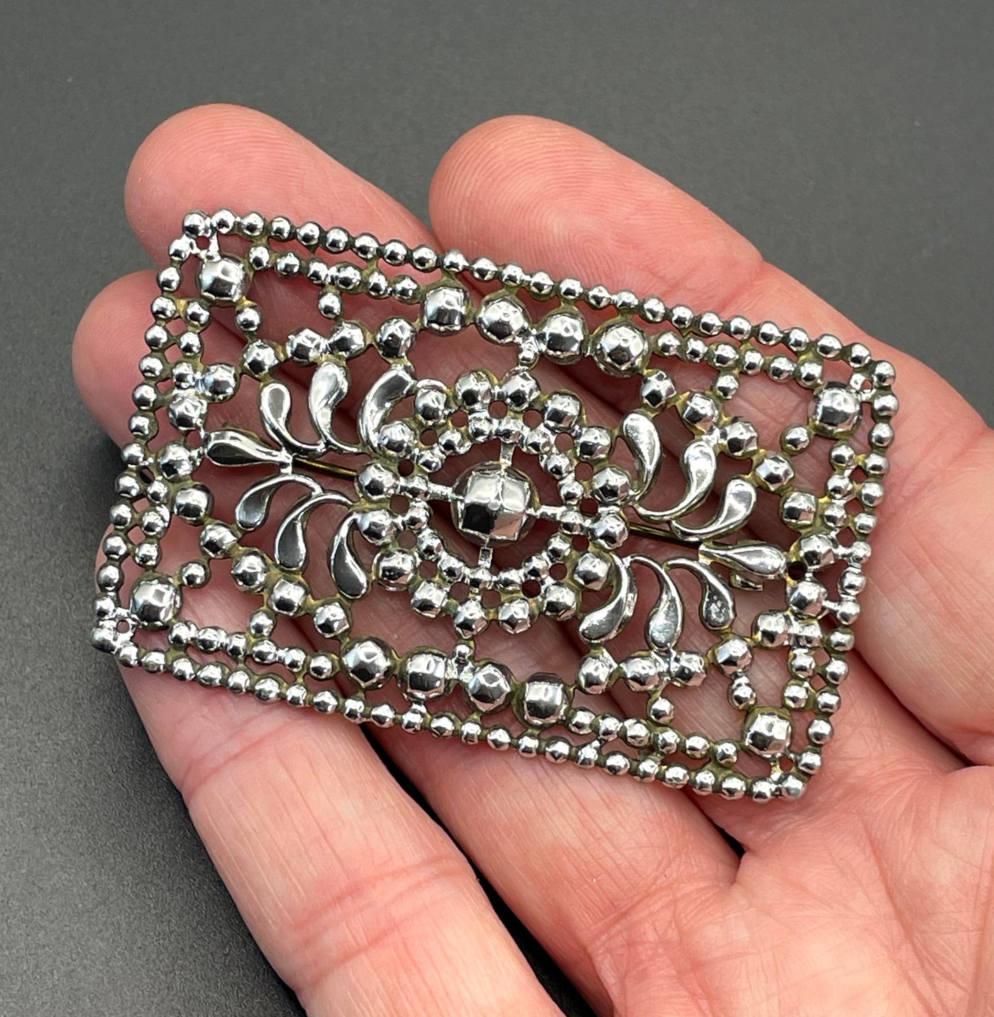 Antique Georgian faceted cut steel effect on brass brooch, rectangular shaped, beautifully ornate sparkly piece