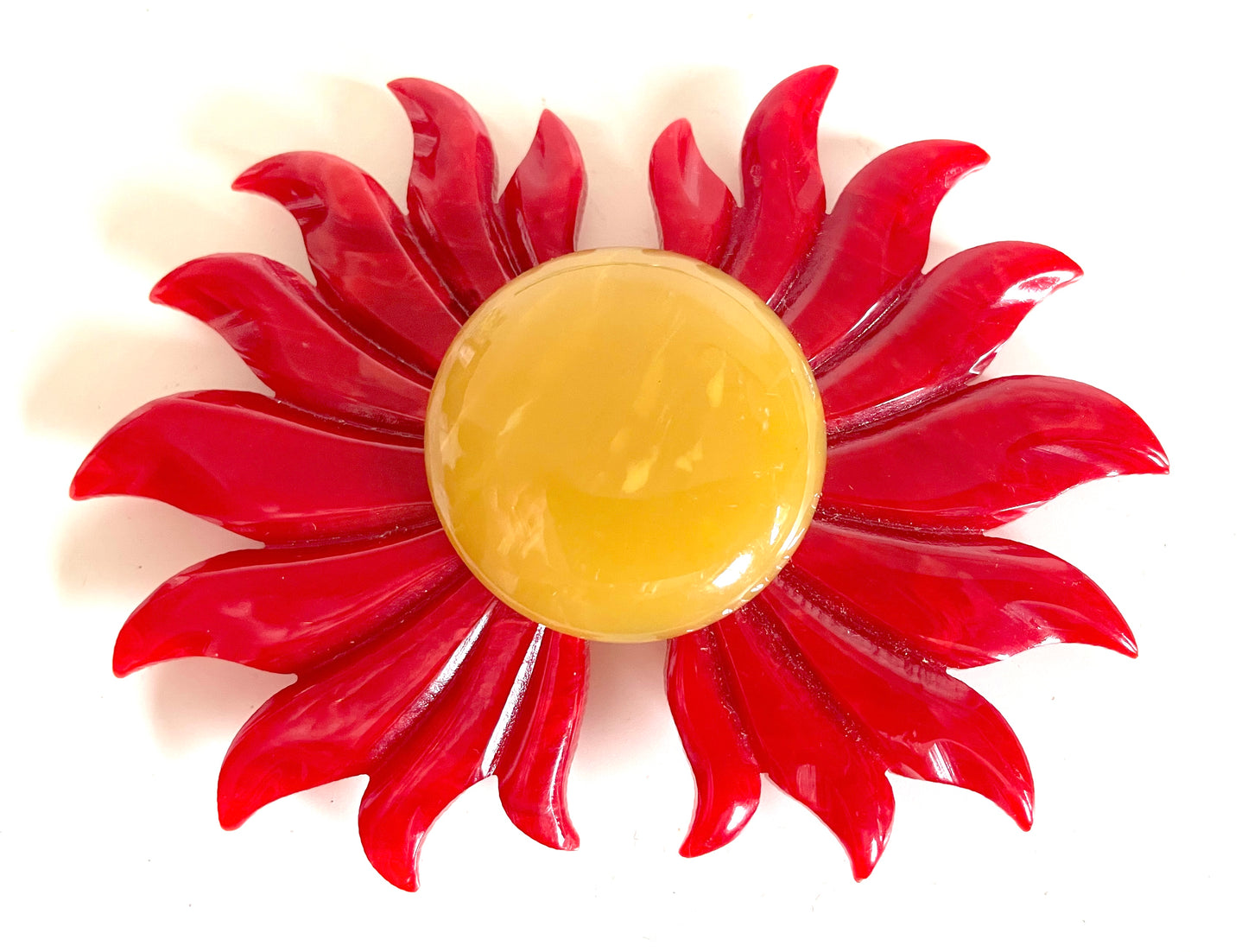 Vintage Art Deco galalith buckle with striking flame design and vibrant yellow, orange and red colours, can be worn as a statement pendant