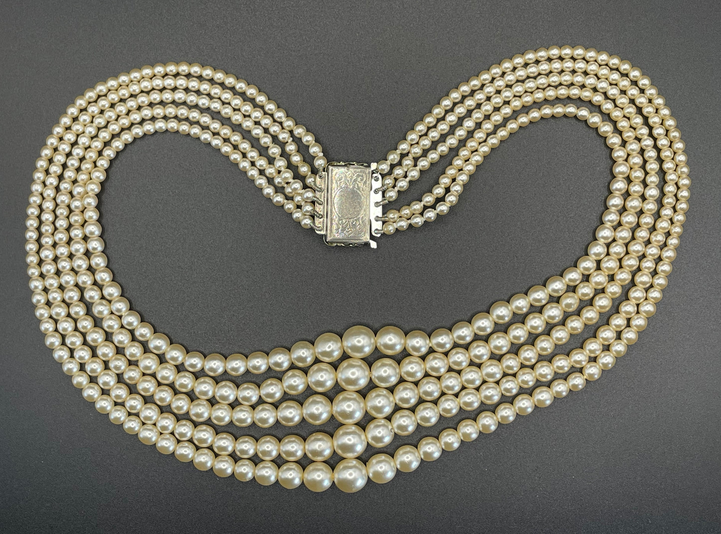 Vintage five strand glass faux pearl necklace with ornate clear rhinestone box clasp, graduated glass pearls