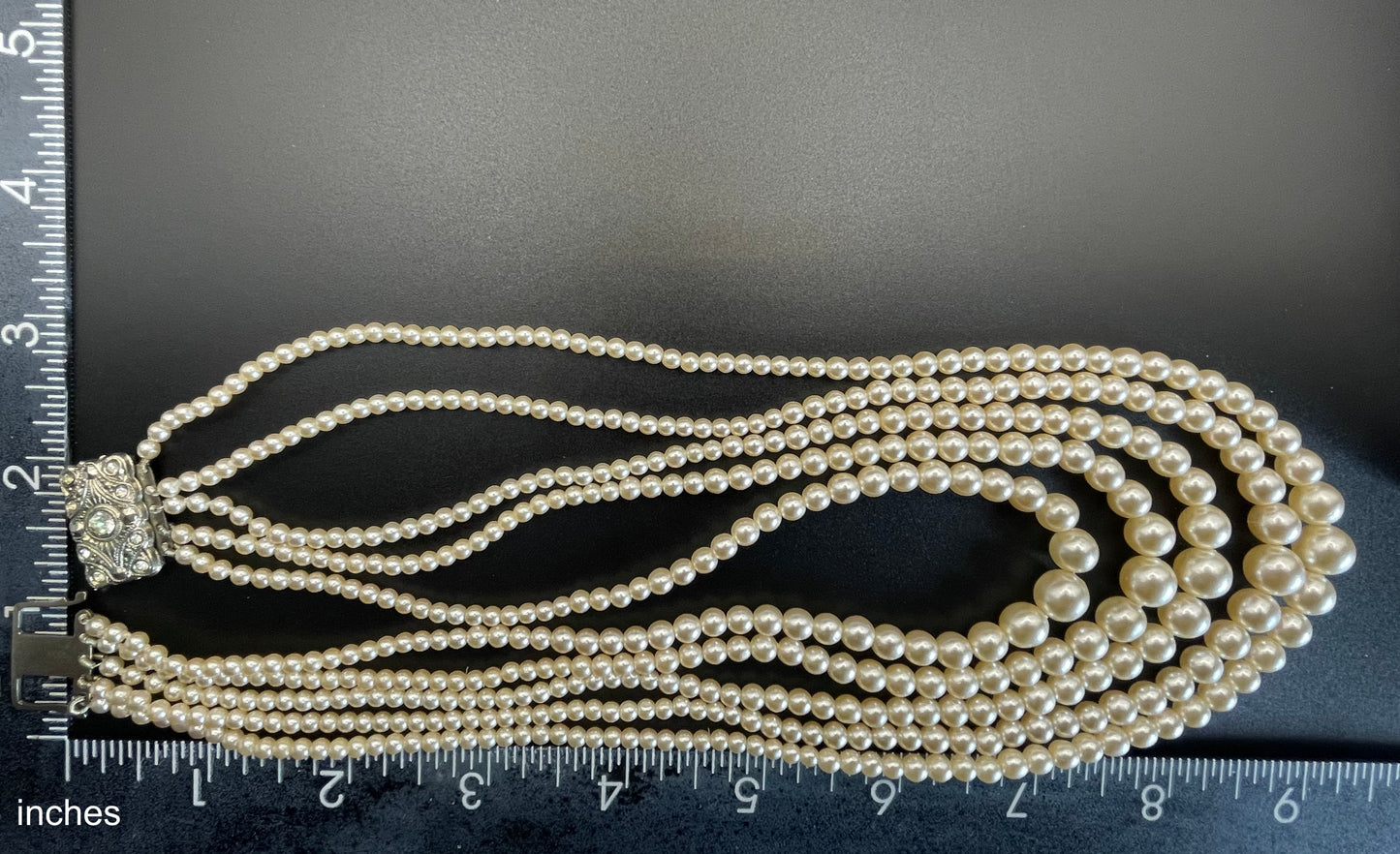 Vintage five strand glass faux pearl necklace with ornate clear rhinestone box clasp, graduated glass pearls