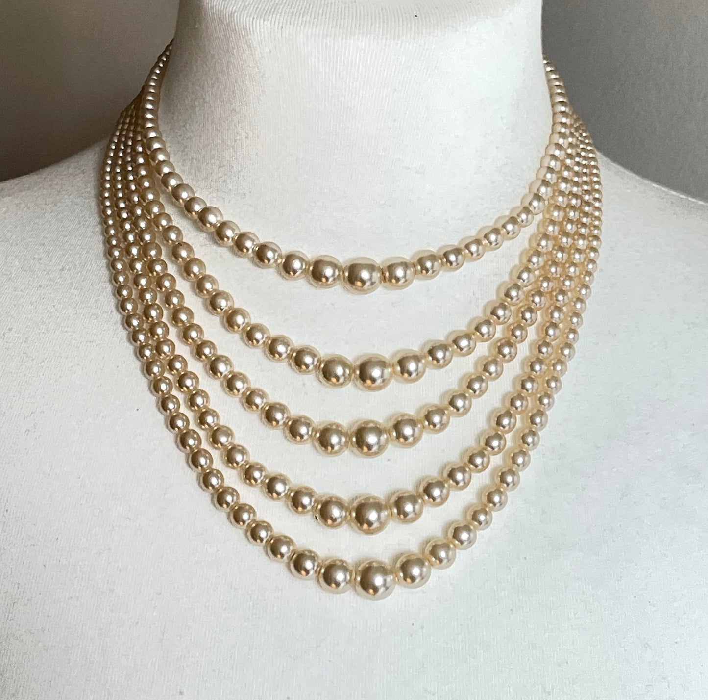 Vintage five strand glass faux pearl necklace with ornate clear rhinestone box clasp, graduated glass pearls