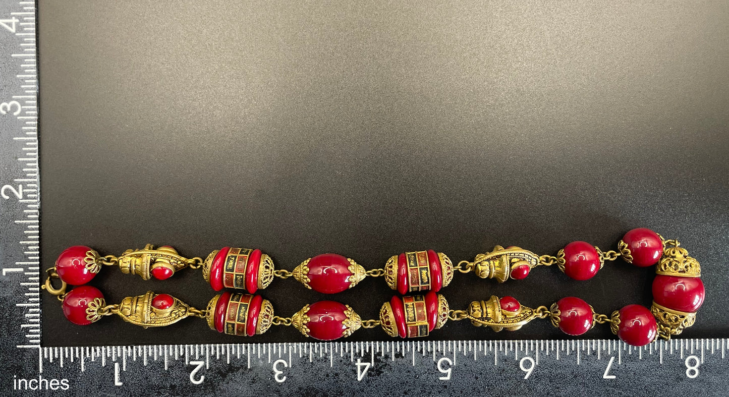 Vintage Neiger Brothers Art Deco heavy red glass bead necklace with beautiful gold tone features - by Max Neiger
