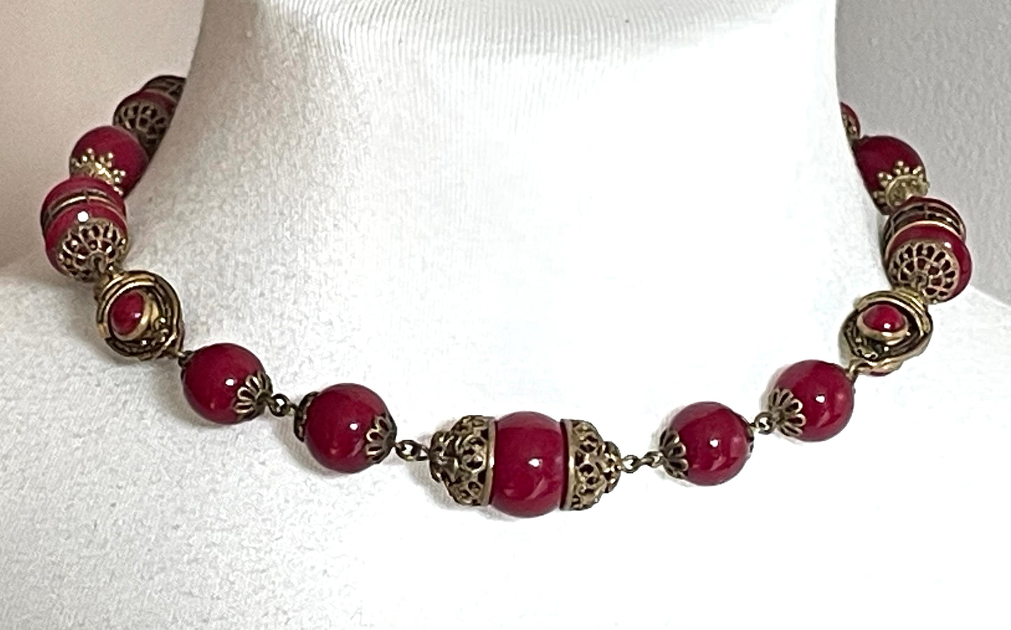 Vintage Neiger Brothers Art Deco heavy red glass bead necklace with beautiful gold tone features - by Max Neiger