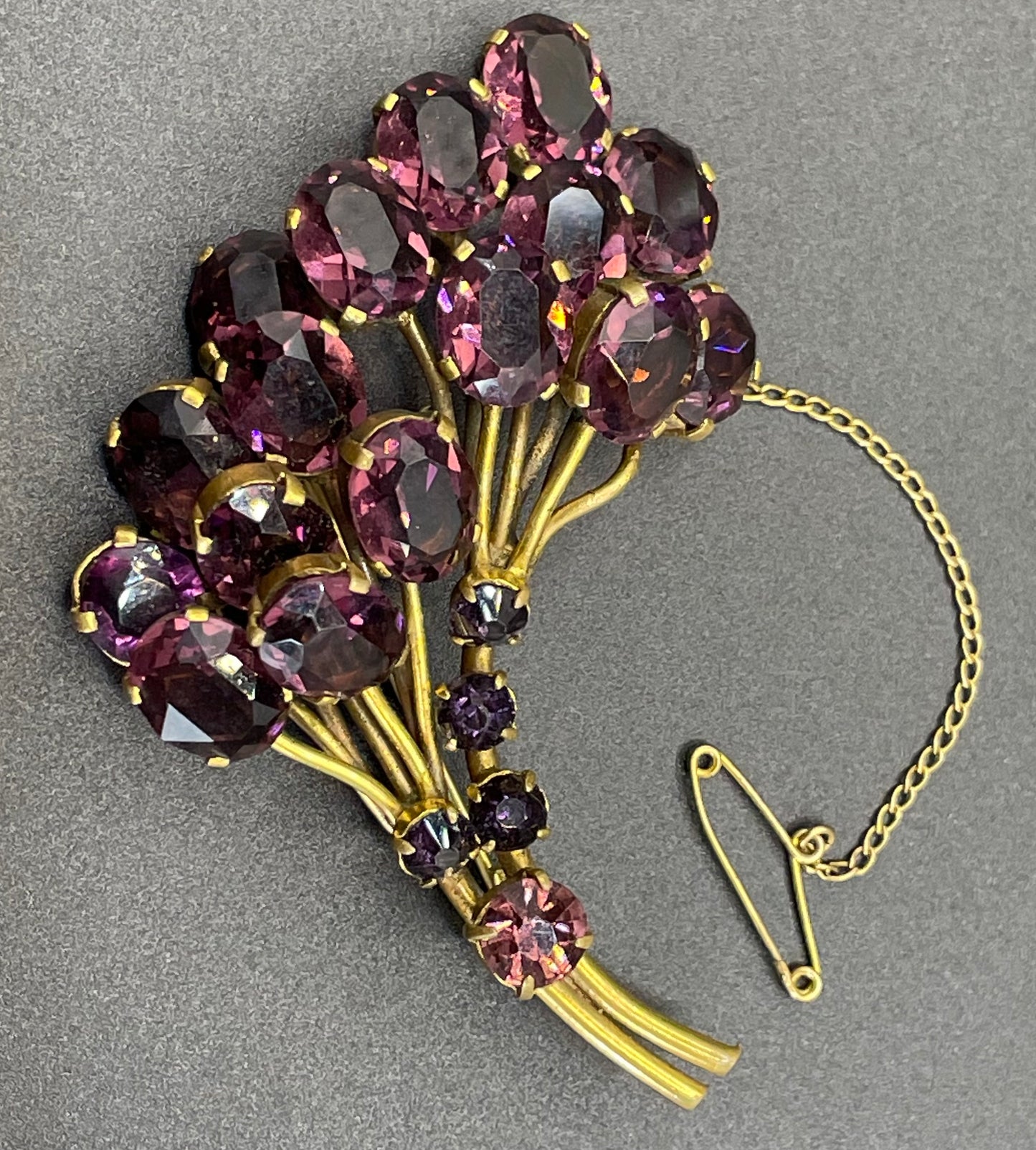 Large vintage Art Deco gorgeous vibrant amethyst purple crystal Czech flower bouquet brooch, open-backed rhinestones in gold tone