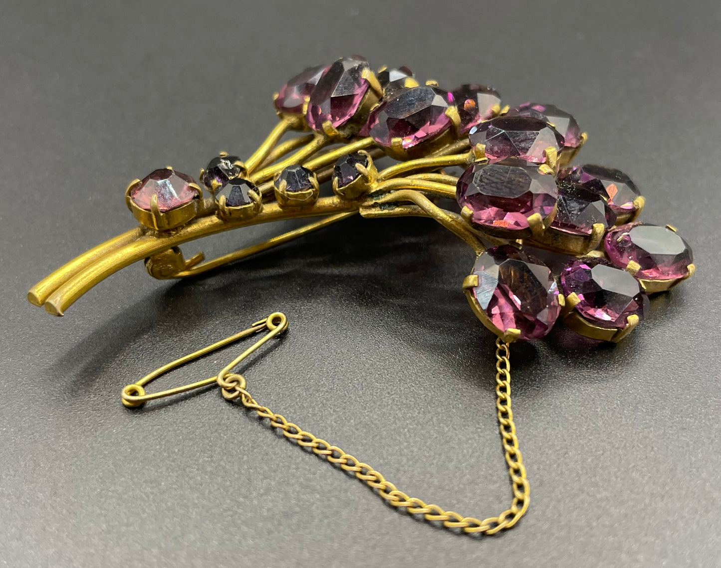 Large vintage Art Deco gorgeous vibrant amethyst purple crystal Czech flower bouquet brooch, open-backed rhinestones in gold tone