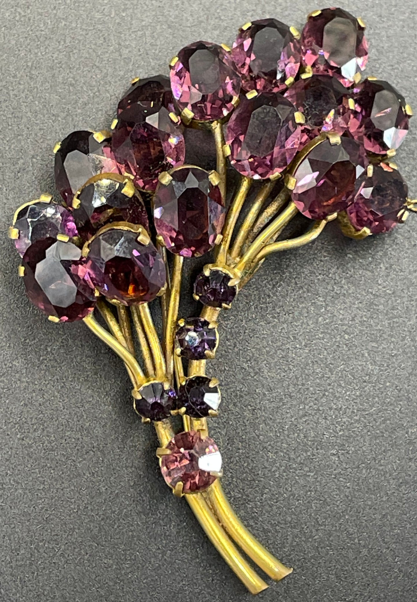 Large vintage Art Deco gorgeous vibrant amethyst purple crystal Czech flower bouquet brooch, open-backed rhinestones in gold tone