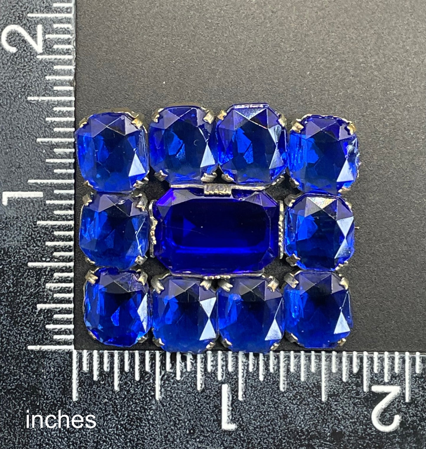 Vintage Art Deco vibrant sapphire blue crystal brooch, open-backed baguette cut rectangular glass rhinestones