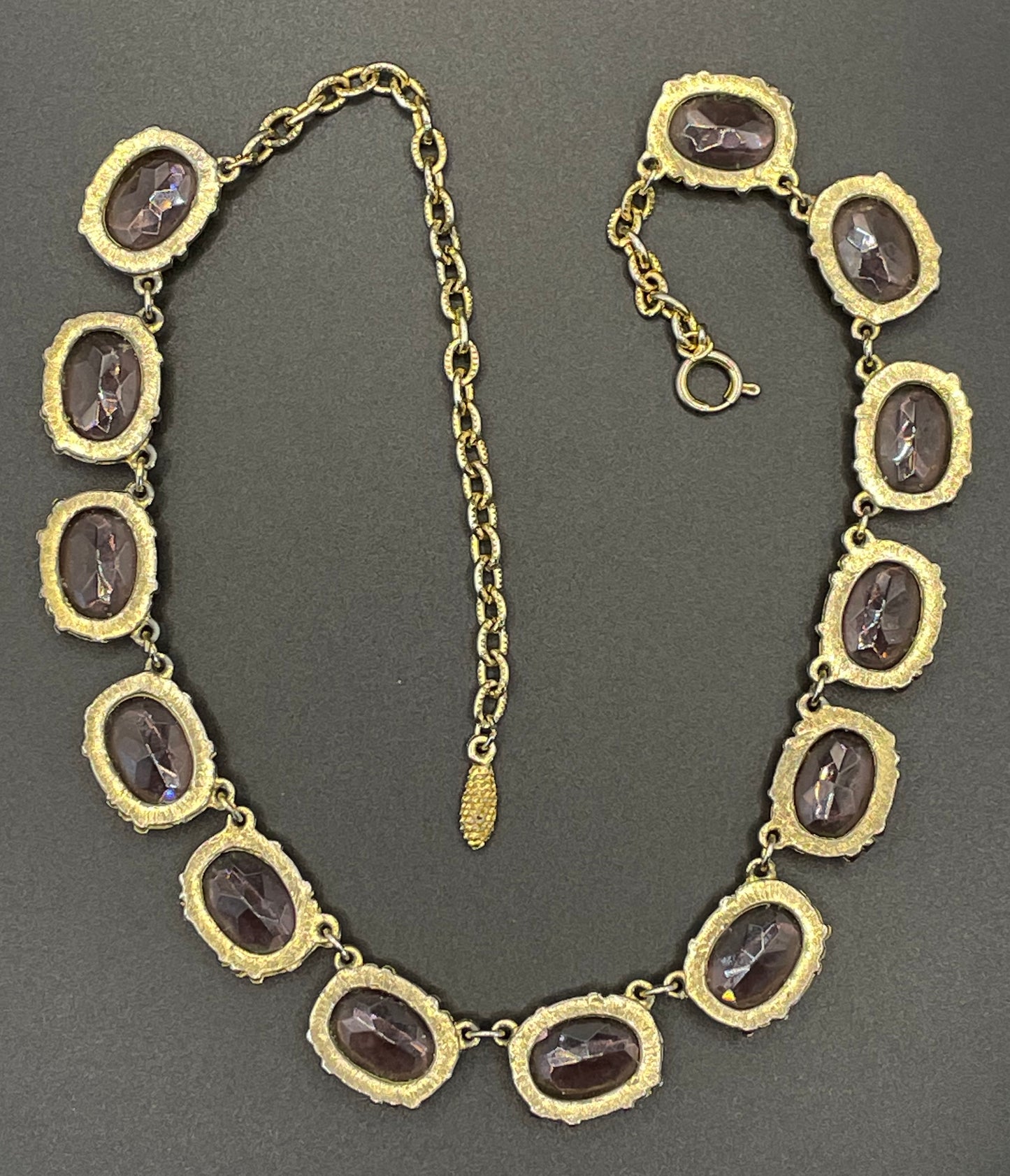 Vintage Sphinx amethyst purple / violet glass riviere necklace, heavy, bezel set, open-backed stones in ornate gold tone setting