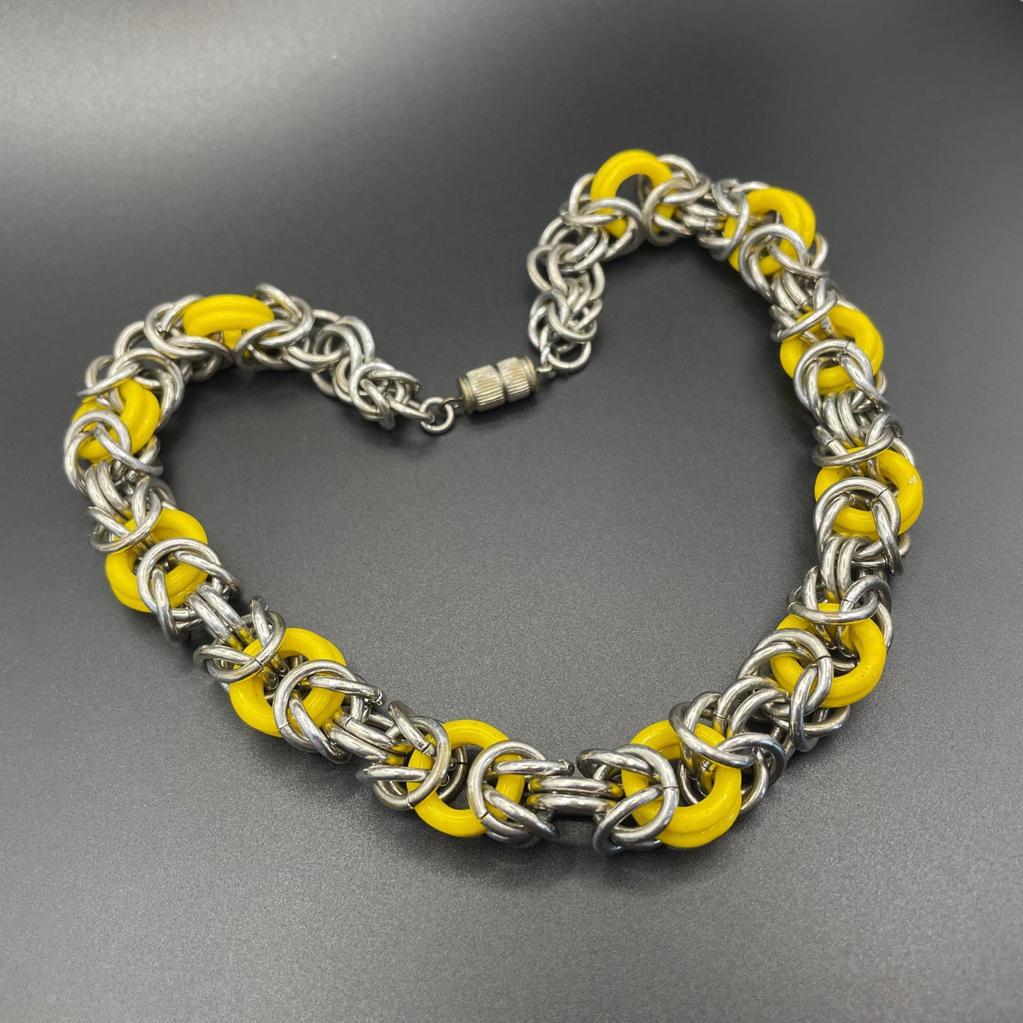 Vintage Jakob Bengel Art Deco 1930s machine age collar necklace with yellow galalith rings and chunky chrome byzantine chain