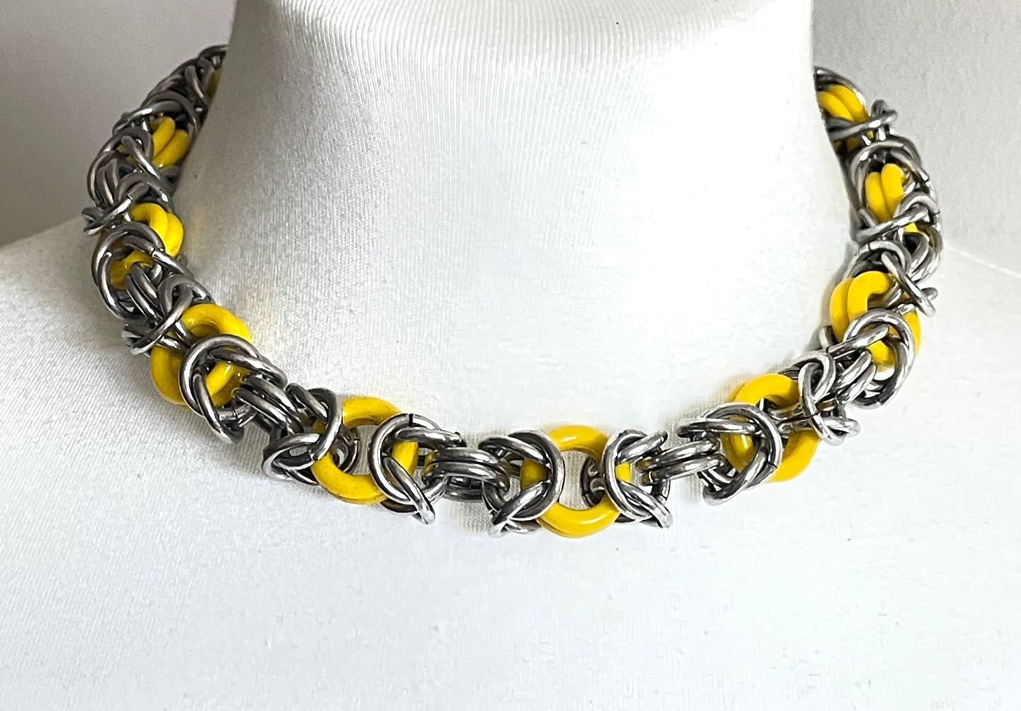 Vintage Jakob Bengel Art Deco 1930s machine age collar necklace with yellow galalith rings and chunky chrome byzantine chain