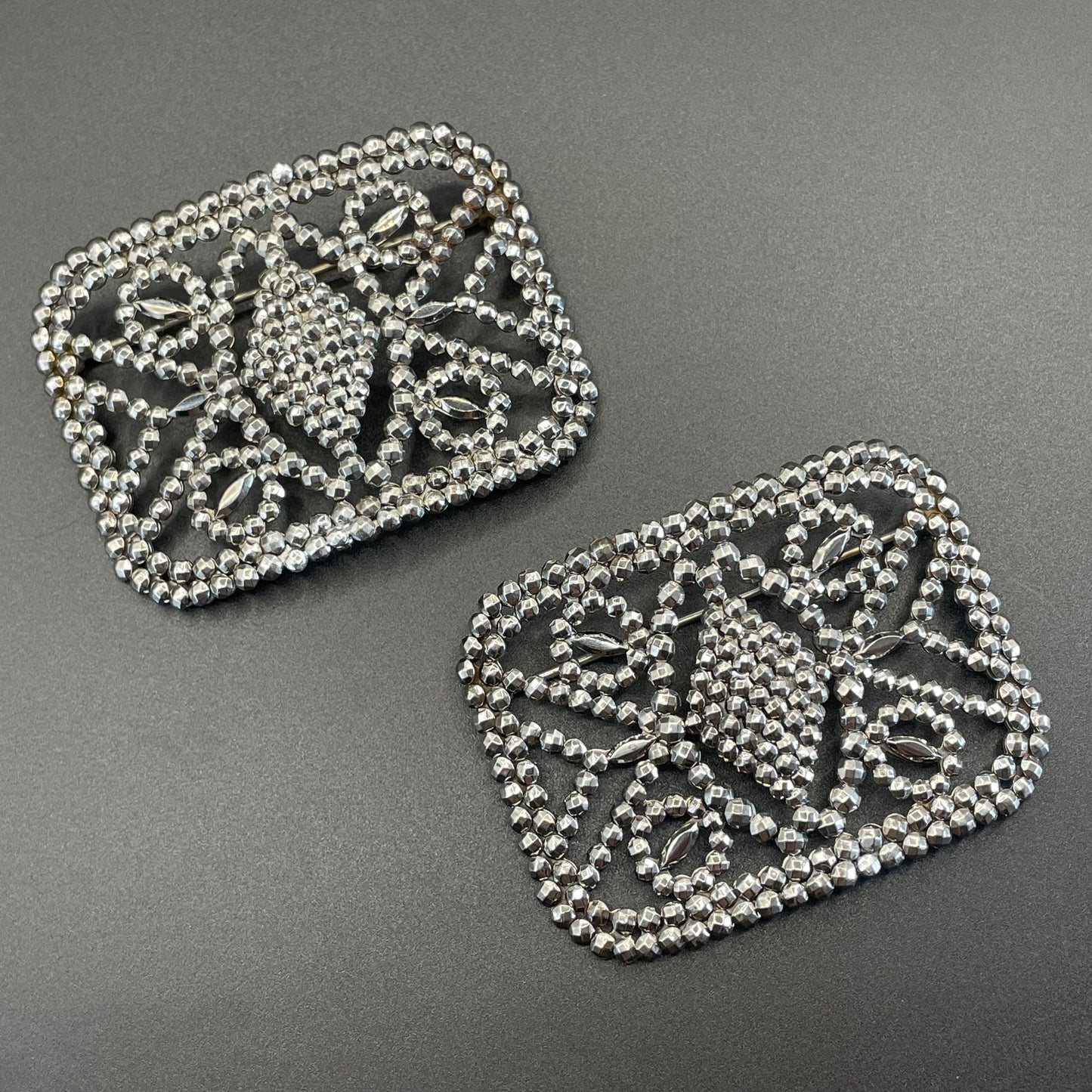 Pair of large antique Georgian cut steel faceted brooches, rectangular shaped, beautifully ornate sparkly pieces