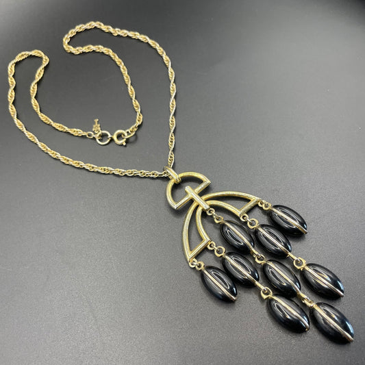 Vintage Trifari signed 1970s gold tone and black plastic / lucite bead disco chandelier pendant necklace and rope chain