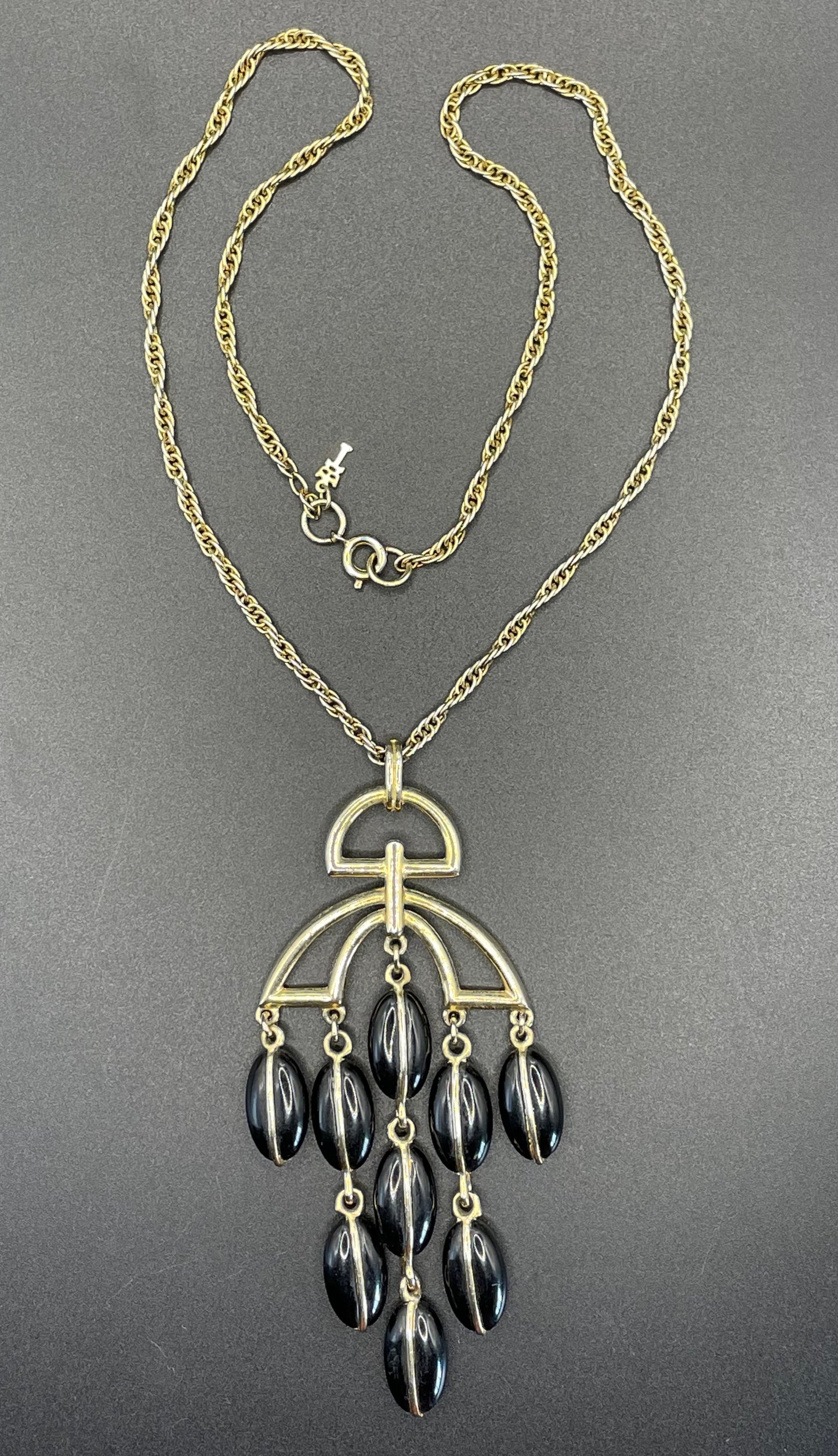 Vintage Trifari signed 1970s gold tone and black plastic / lucite bead disco chandelier pendant necklace and rope chain