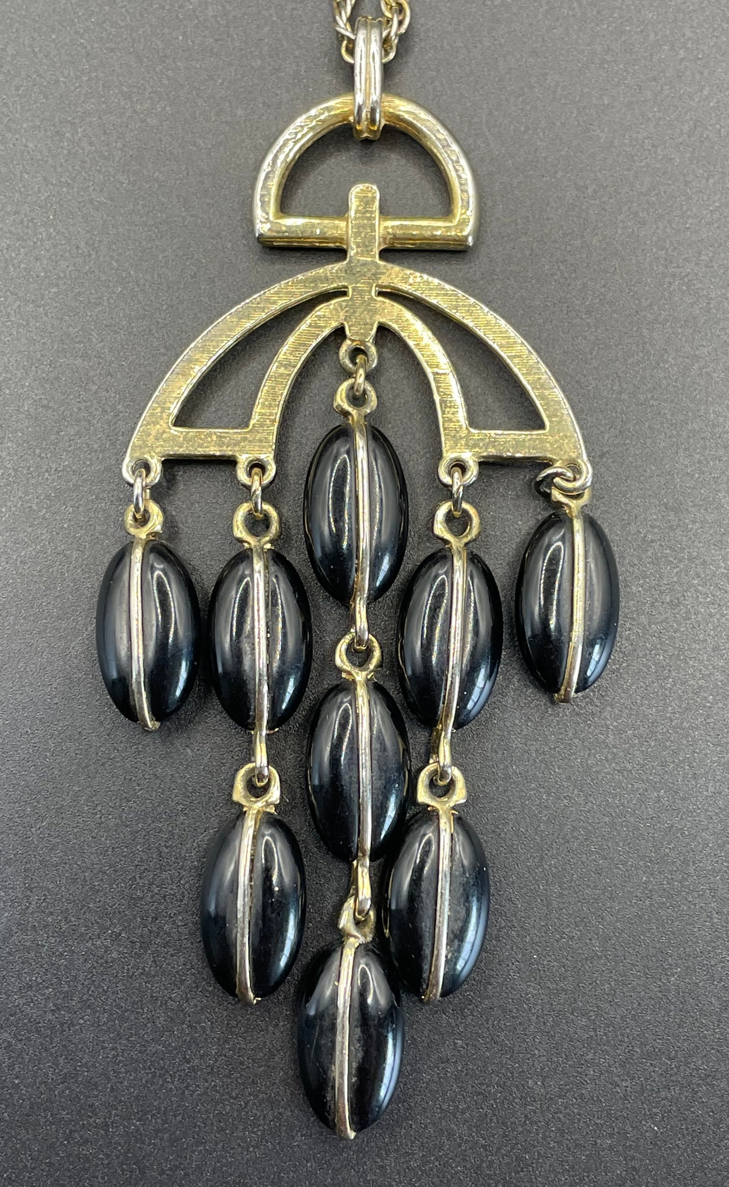 Vintage Trifari signed 1970s gold tone and black plastic / lucite bead disco chandelier pendant necklace and rope chain