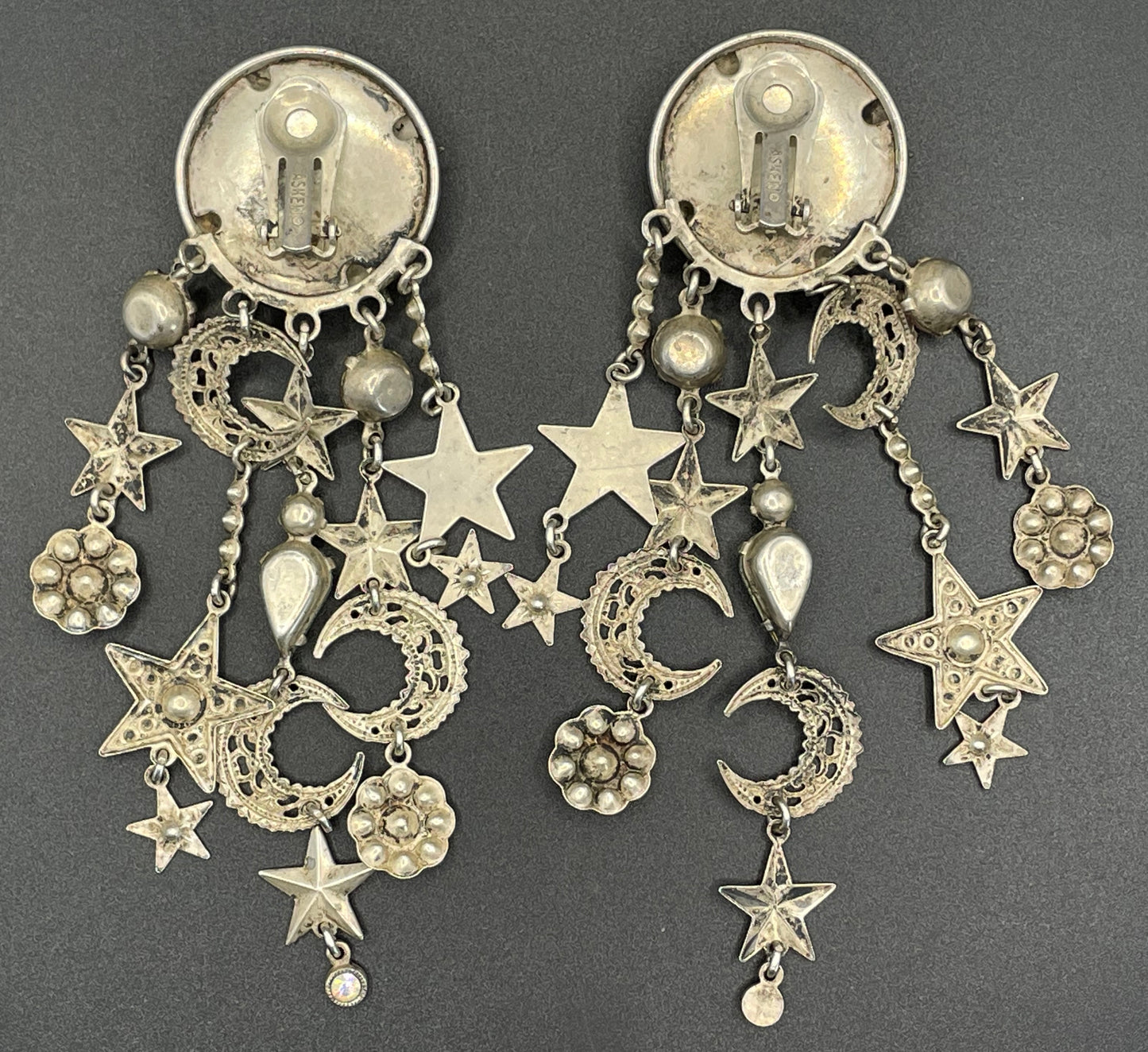 Vintage signed Askew London celestial long dangle chandelier clip-on earrings with lots of rhinestones and a star and moon motif