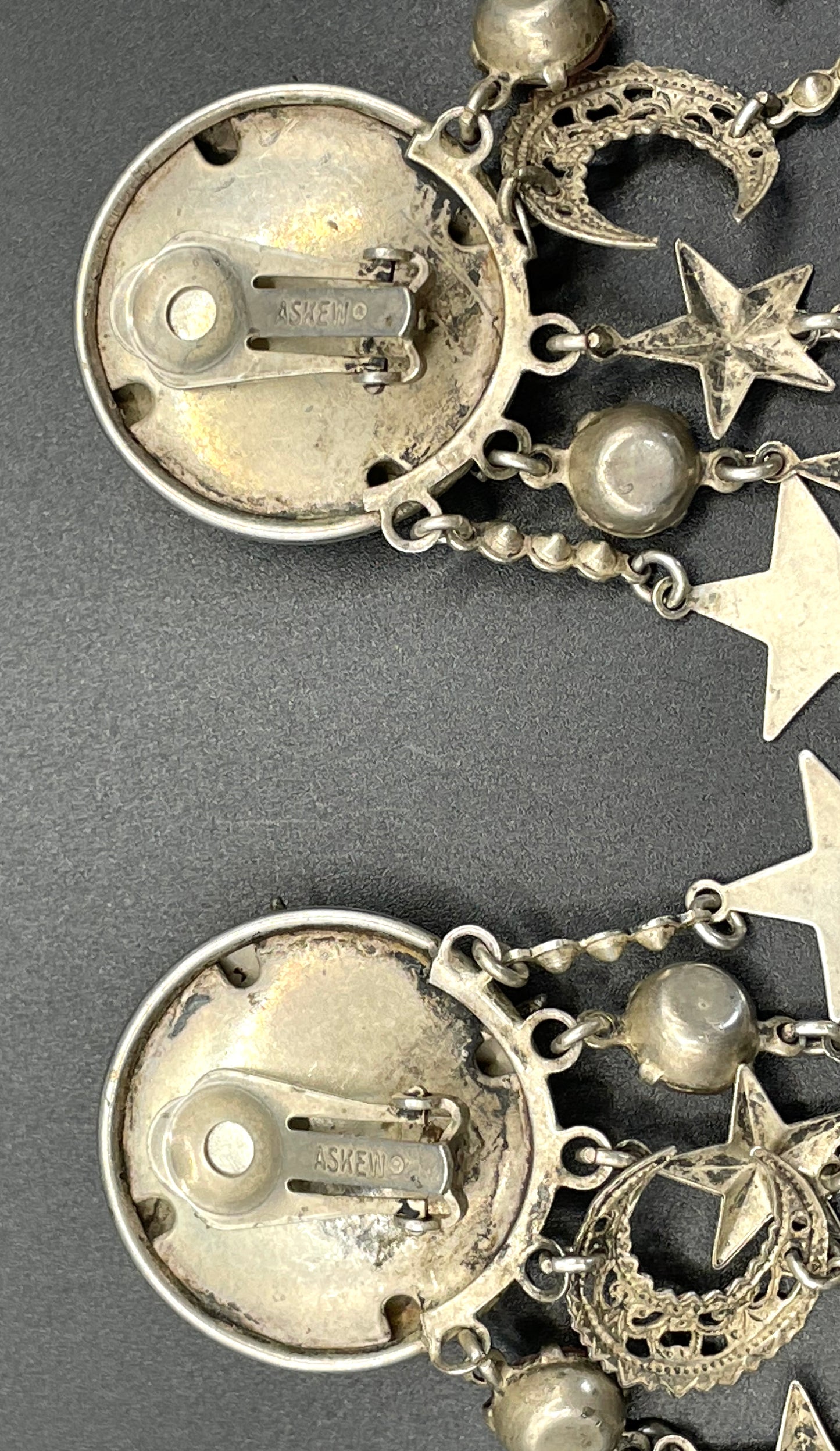 Vintage signed Askew London celestial long dangle chandelier clip-on earrings with lots of rhinestones and a star and moon motif