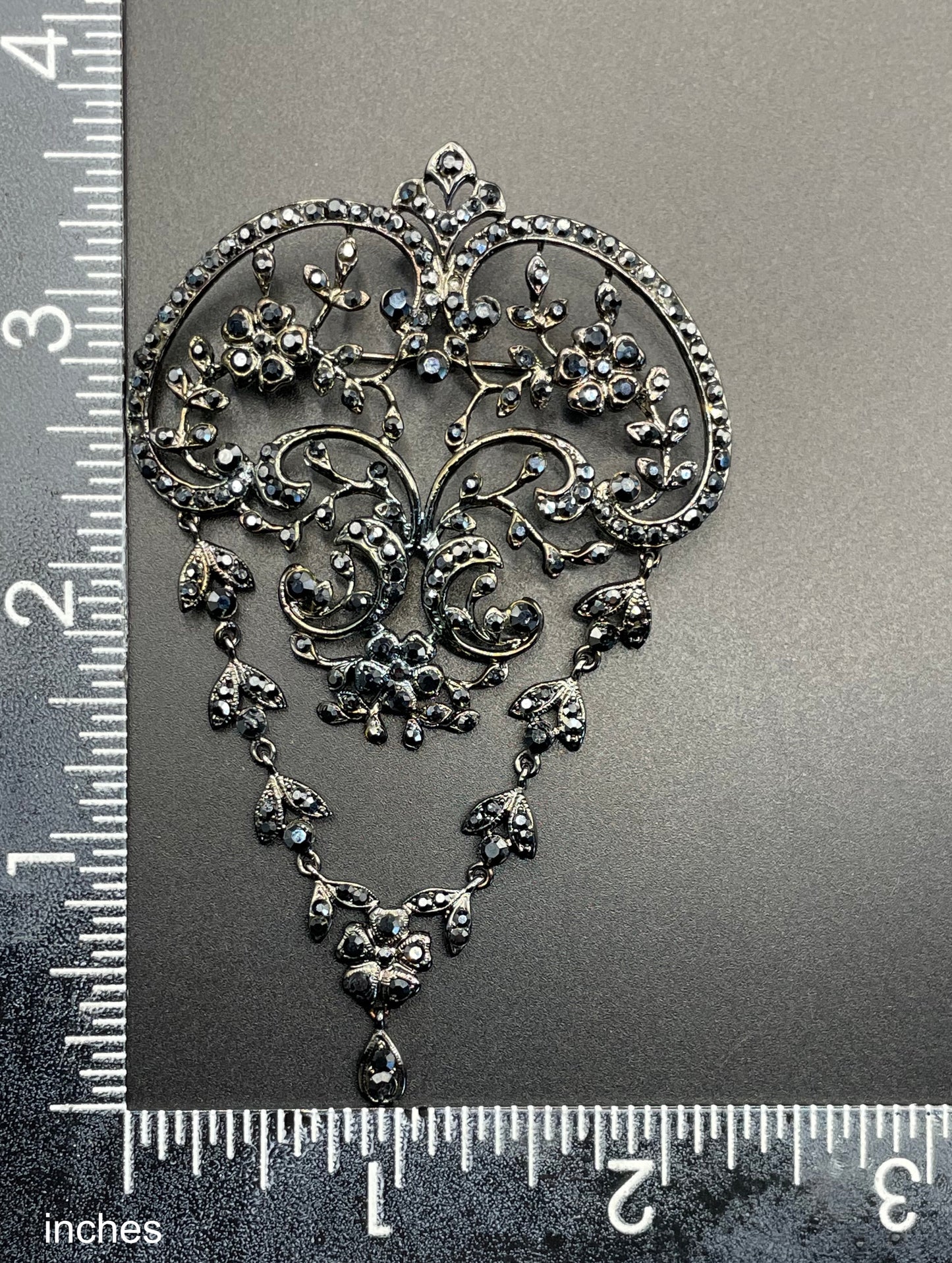 Large vintage Butler and Wilson (B&W) signed blackened silver tone and black French jet rhinestone ornate festoon 'stomacher' brooch