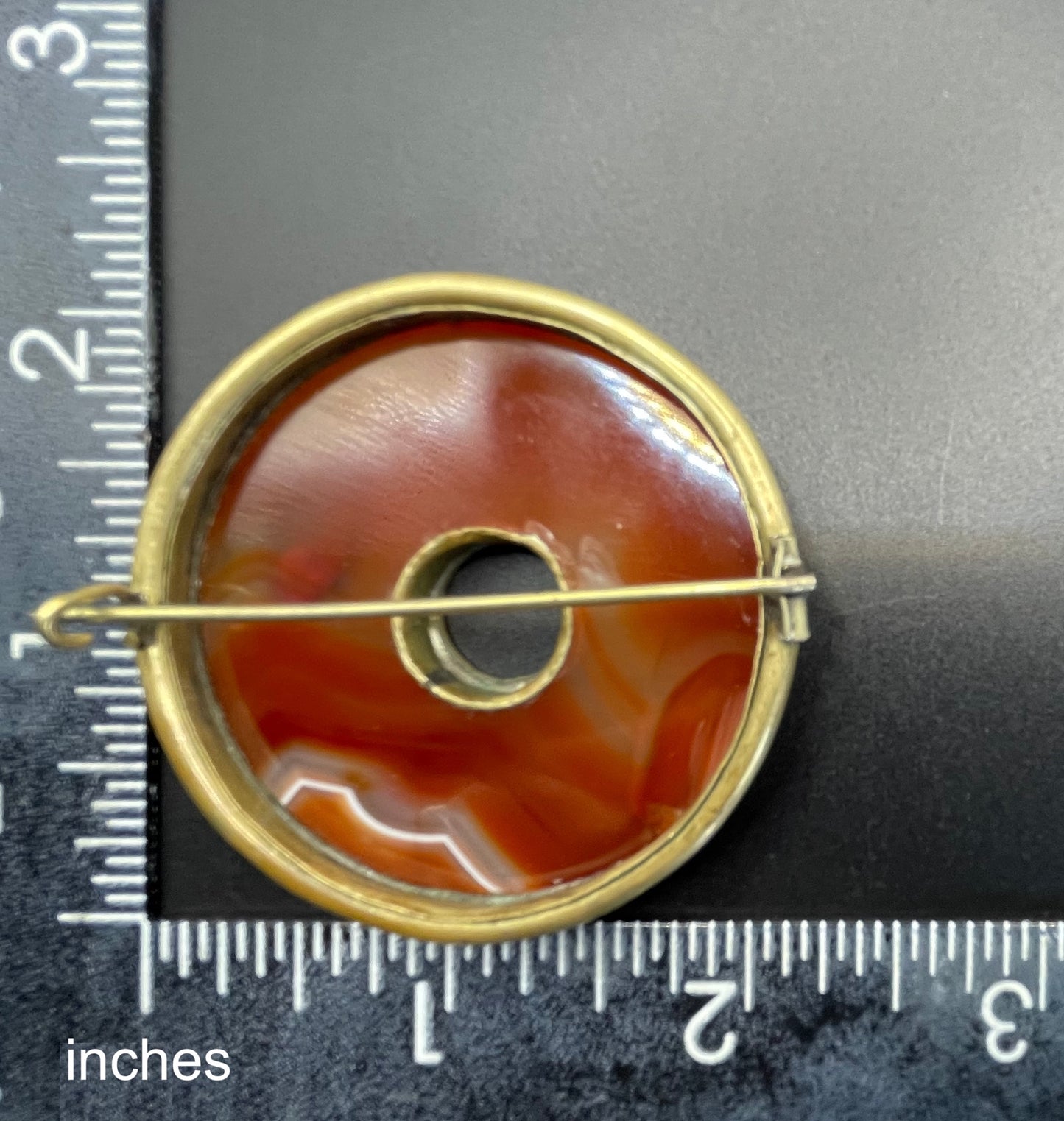 Large antique Victorian Scottish carnelian agate and gold tone circular ring brooch pin, beautiful orange stone