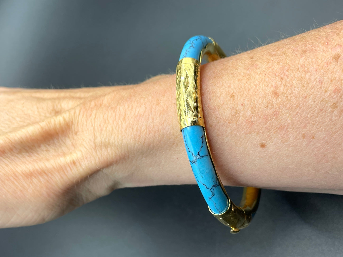 Beautiful Vintage Chinese engraved gold plated and blue turquoise inset hinged Mandarin bangle
