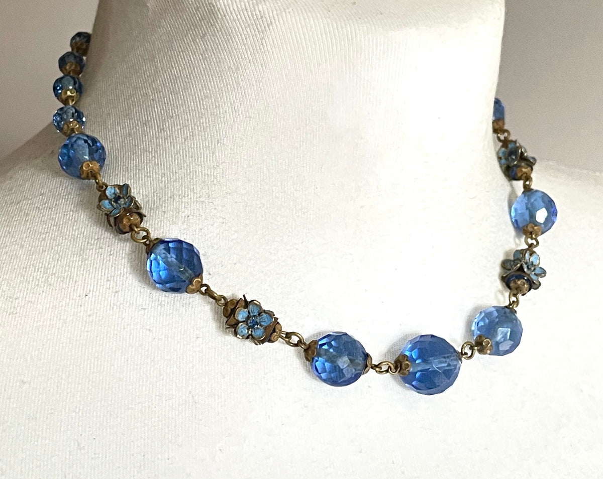 Vintage Art Deco faceted sapphire blue glass bead and rhinestone Czech necklace with beautiful gold tone and enamel painted floral features