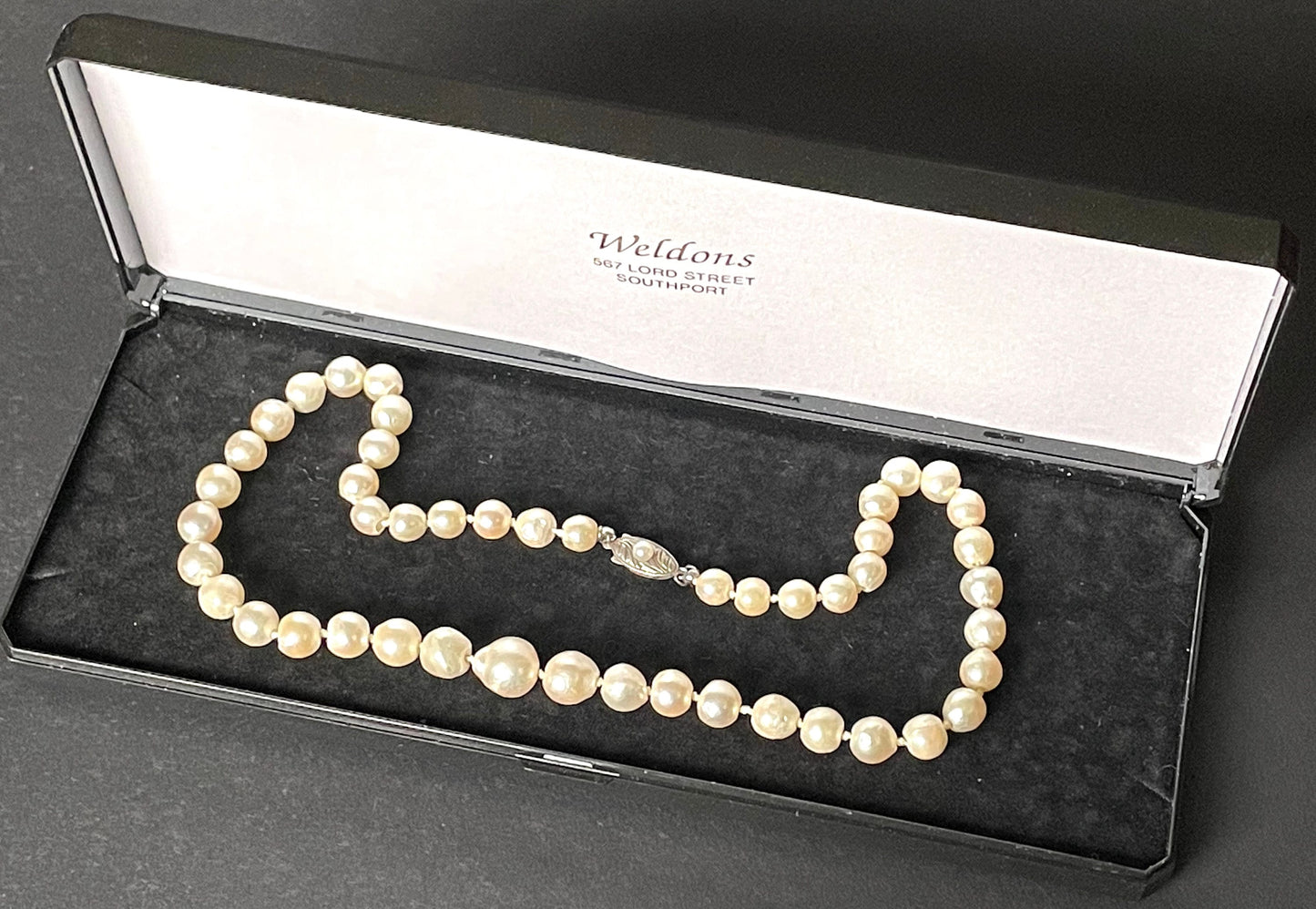 Antique real cultured baroque pearl necklace, large and graduated in size, hand-knotted, in jeweller's box, pretty sterling silver clasp 30 grams