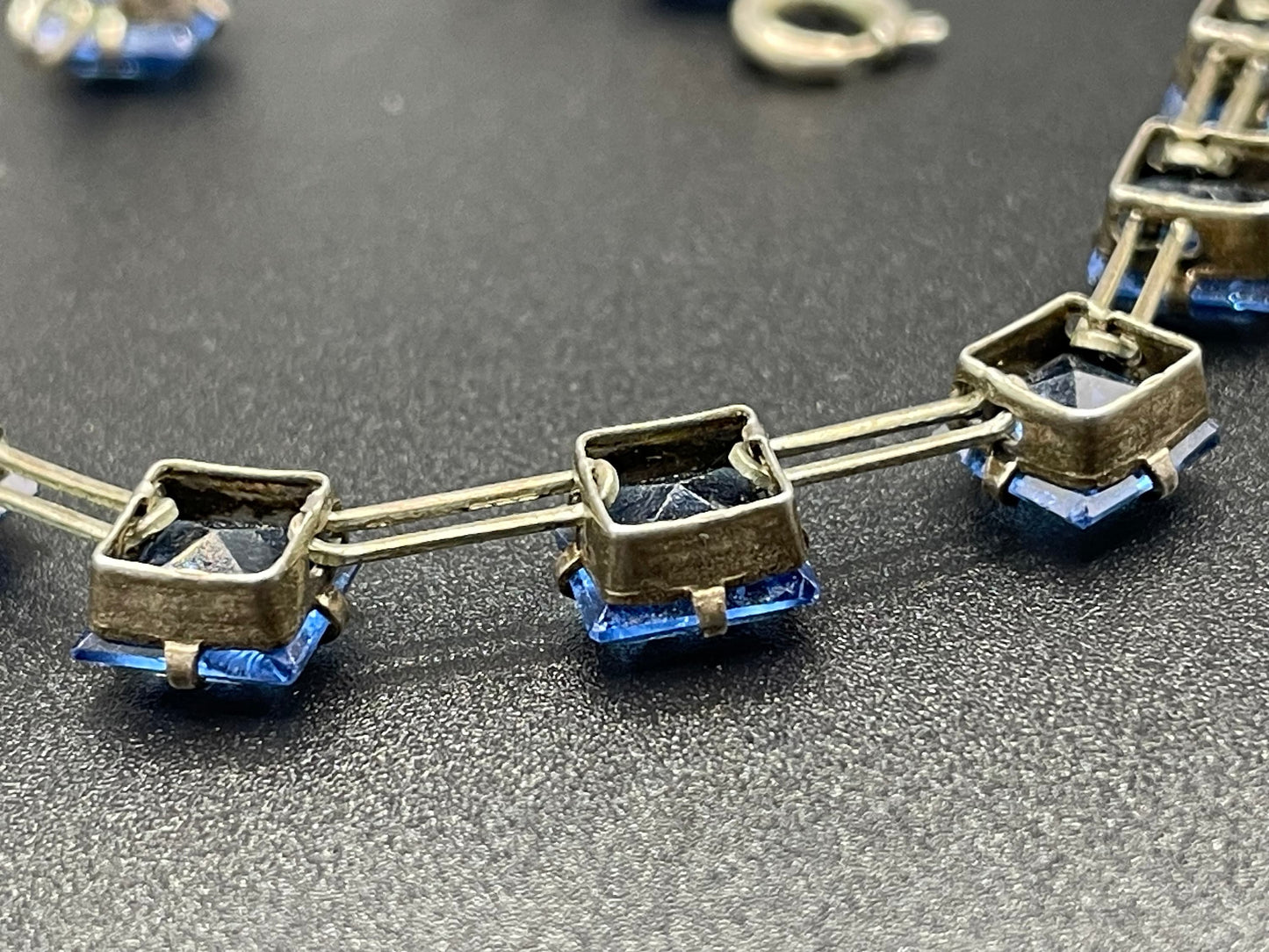Vintage Sterling silver Art Deco bezel set sapphire blue crystal riviere necklace, open-backed princess cut (square) rhinestones, hallmarked, by W H Collins