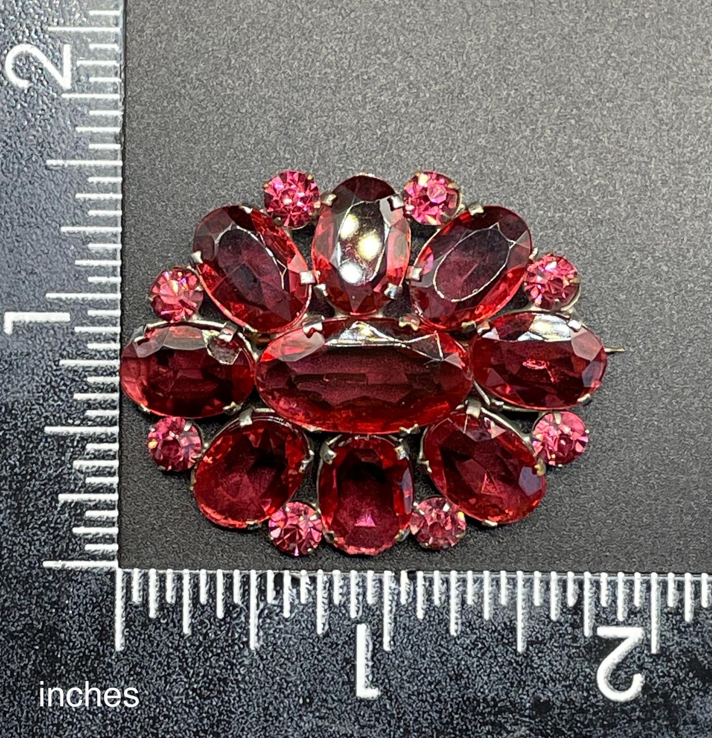 Vintage Art Deco ruby pink glass rhinestone, open-backed, pale antique gold tone brooch pin, stunning pink colour