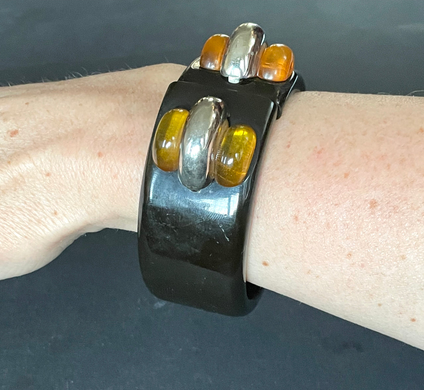 Vintage Bakelite (verified) Art Deco machine age geometric bangle with black and apple juice Bakelite and chromed accents