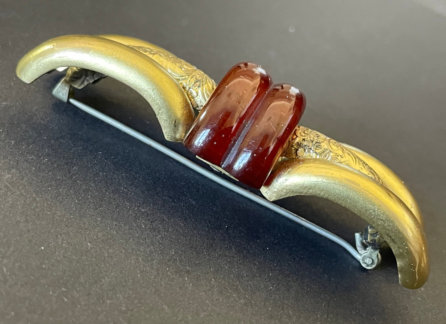 Large vintage rootbeer Bakelite (verified) and gold tone pinchbeck ? Art Deco machine age geometric brooch, classic 1930s design