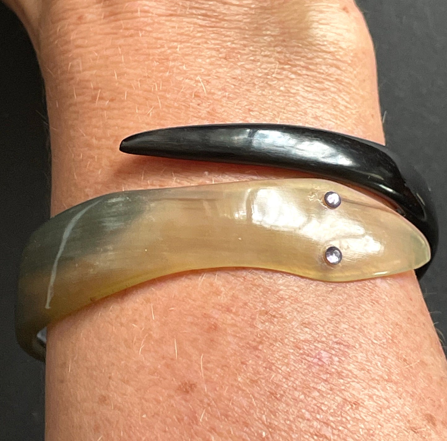 Vintage Art Deco 1920s to 1930s large carved horn snake spiral bangle bracelet, purple violet rhinestone eyes