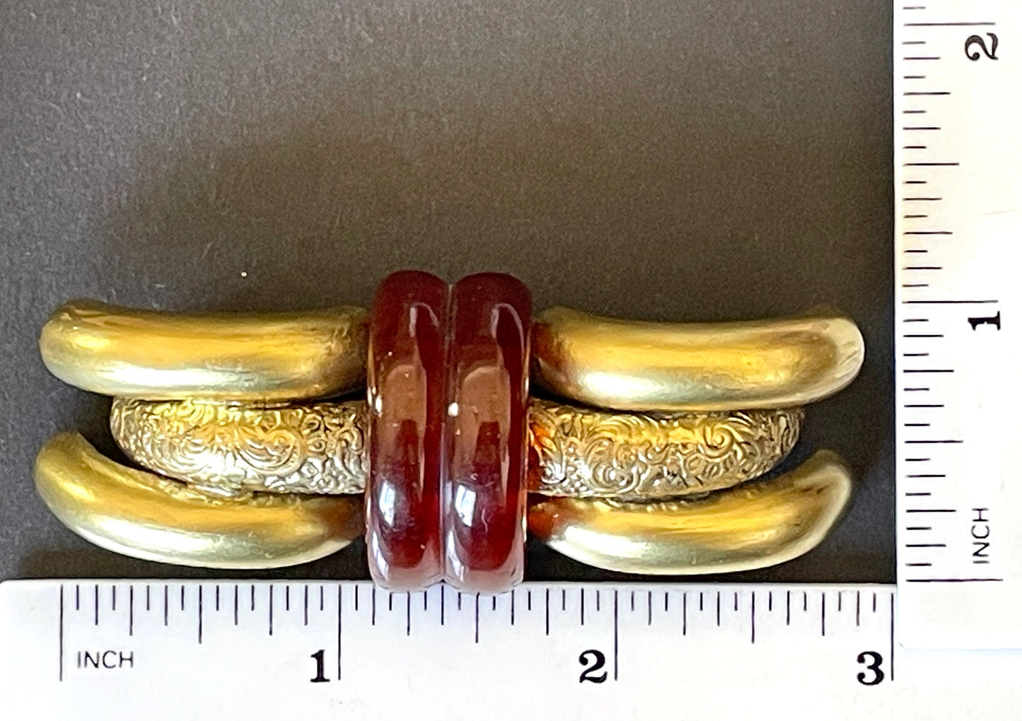 Large vintage rootbeer Bakelite (verified) and gold tone pinchbeck ? Art Deco machine age geometric brooch, classic 1930s design