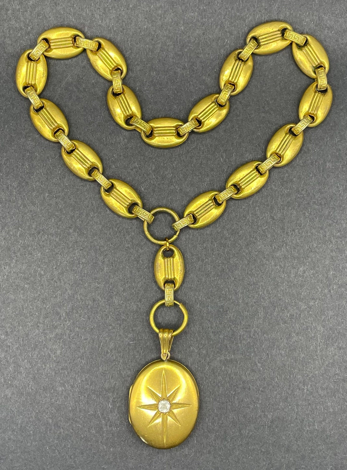 Antique Victorian gold plated or rolled gold heavy bookchain necklace with large oval locket, gypsy set with beautiful clear paste stone