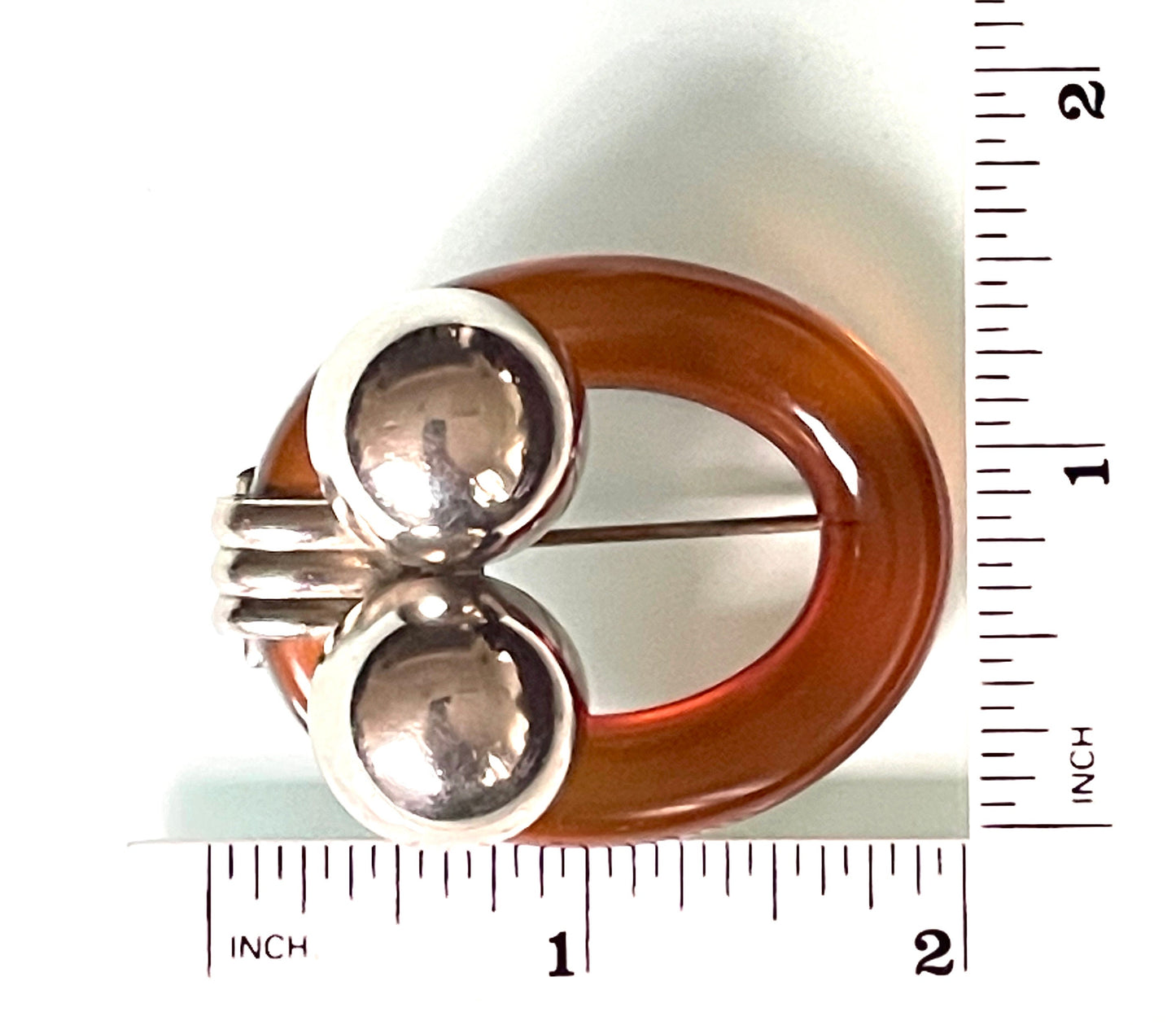 Vintage rootbeer Bakelite (verified) and chrome Art Deco machine age geometric hat / lapel pin brooch, classic 1930s design