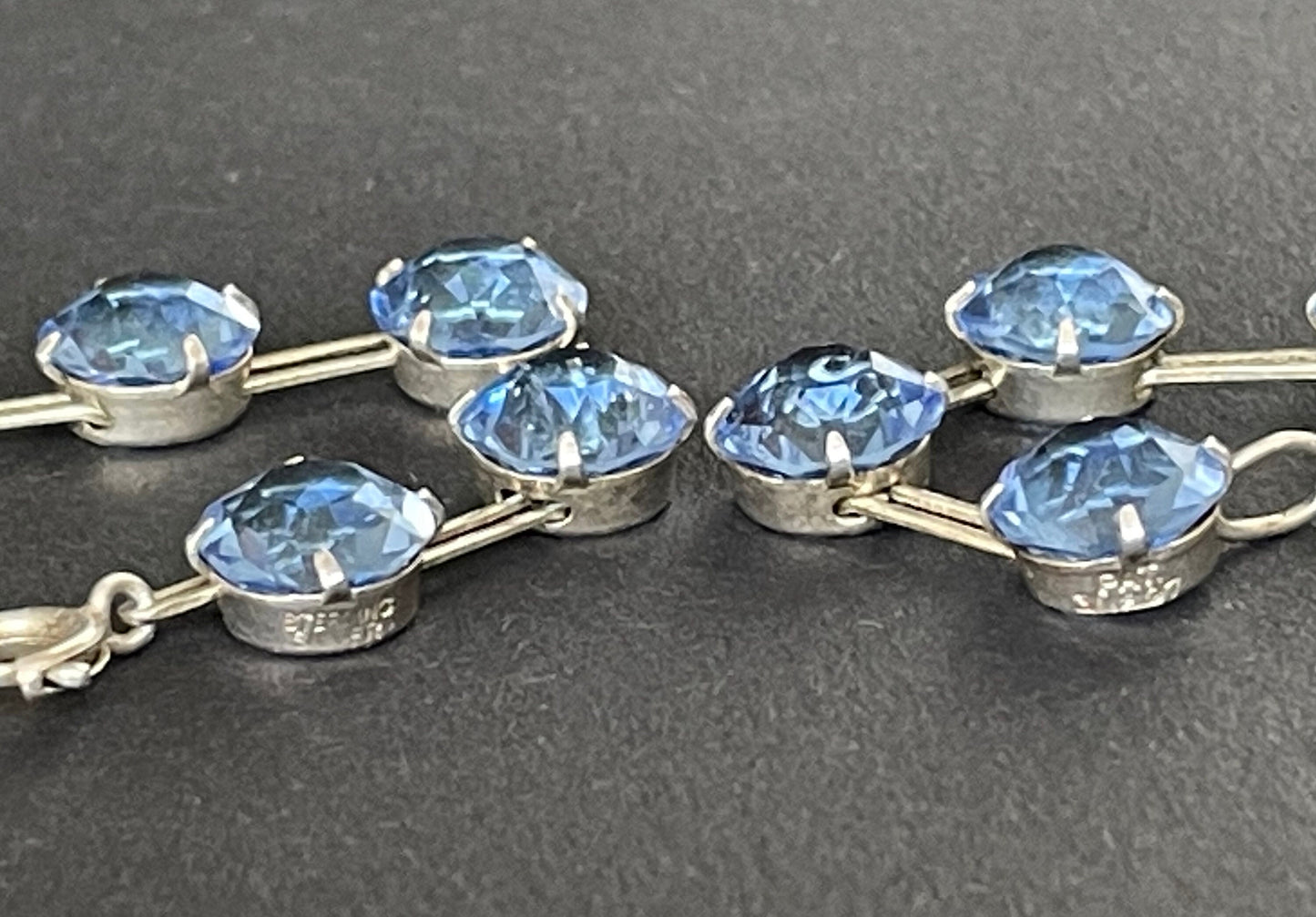 Vintage sterling silver Art Deco sapphire blue chaton cut crystal rhinestone riviere necklace bezel set, open backed, by W H Collins
