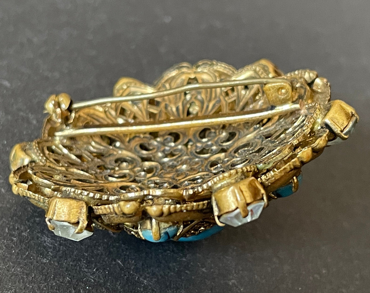 Large vintage Art Deco faux turquoise glass cabochon, clear paste rhinestone and gold tone filigree Czech flower brooch