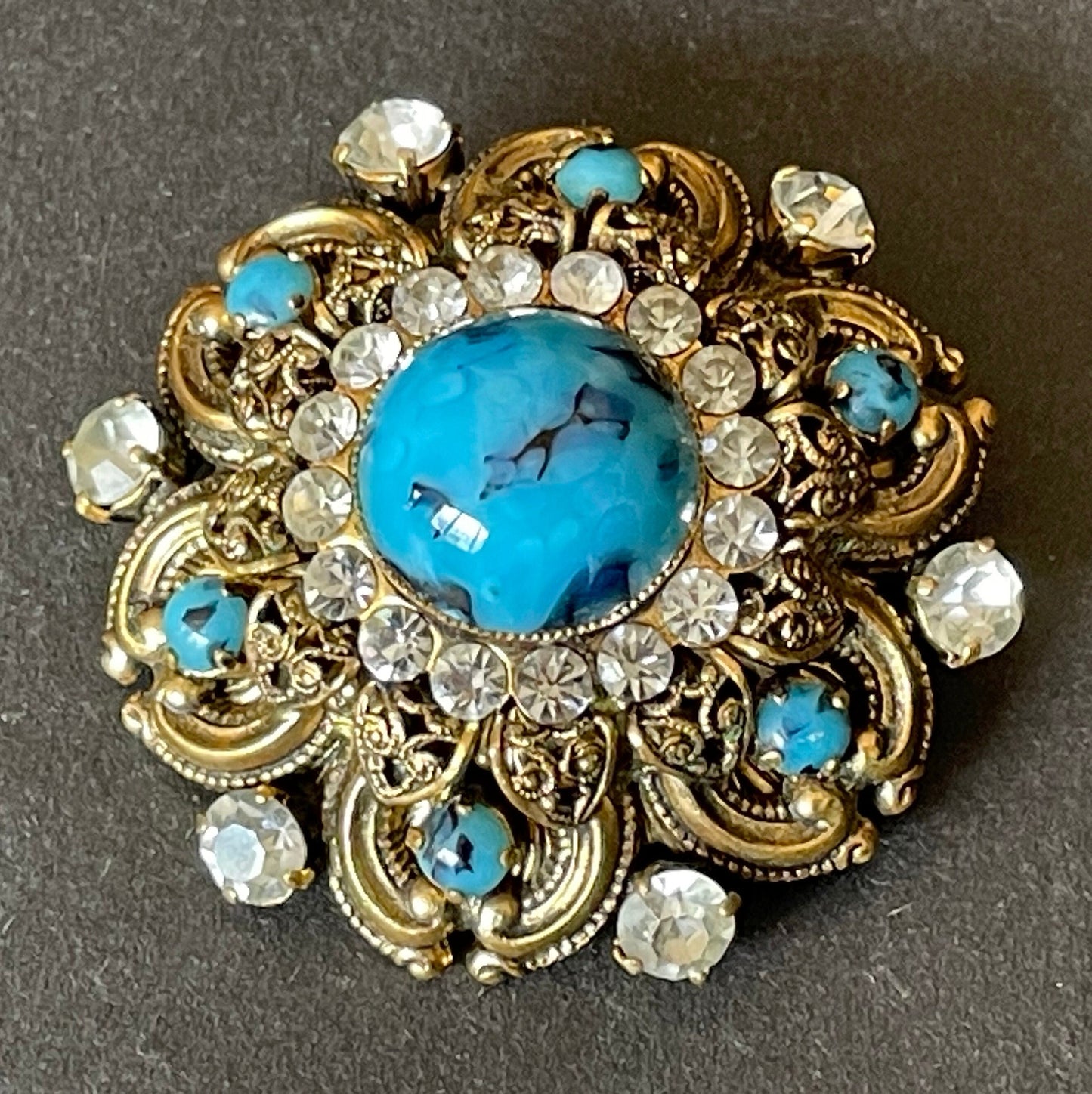 Large vintage Art Deco faux turquoise glass cabochon, clear paste rhinestone and gold tone filigree Czech flower brooch